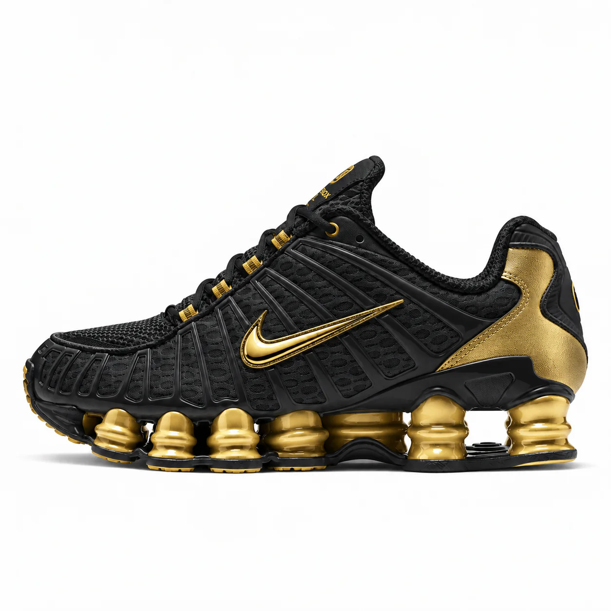 Nike Shox TL in black, gold, side view of the sneaker on a white background.