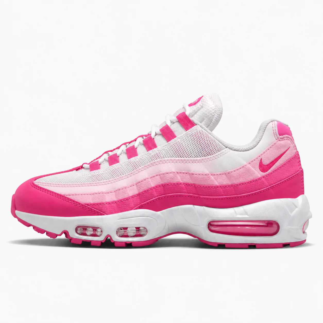 Nike Air Max 95 in white, pink, side view of the sneaker on a white background.