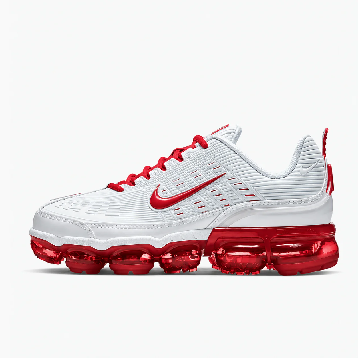 Nike Air VaporMax Plus in white, red, side view of the sneaker on a white background.
